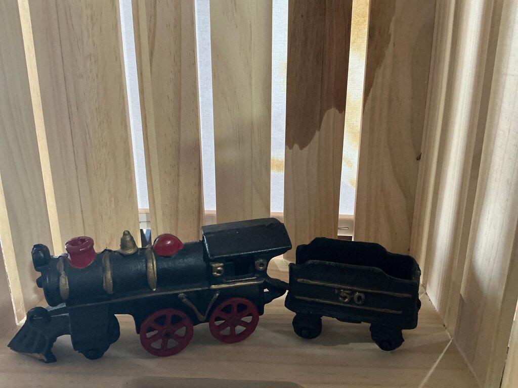 Vintage Black and Red Toy Train Set
